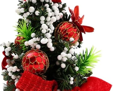 a christmas tree with red ornaments and decorations