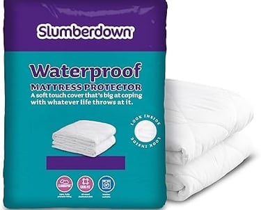 a pillow that is sitting on top of a pillow