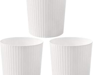 three white pleated paper cups with pleated plea