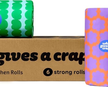 a box of rolls of paper towels with a roll of rolls of paper