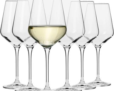 a group of wine glasses with white wine in a row