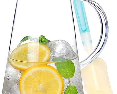 a pitcher of lemonade in a pitcher of water