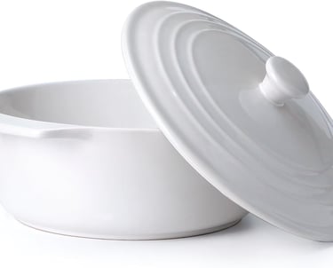 a white bowl with a lid and a lid on it