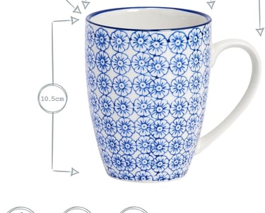 a blue and white coffee mug with a blue flower pattern