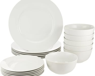 a set of white dishes and plates with white dishes