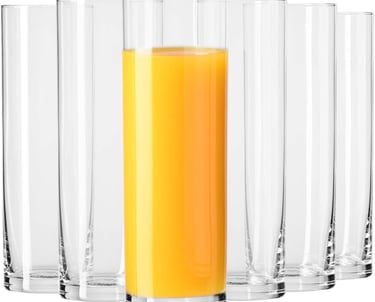a group of glasses with orange juice in them