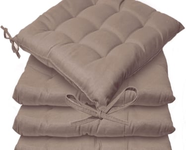 a stack of four cushions with ties tied to them