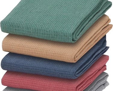 a stack of towels and towels in a stack of four
