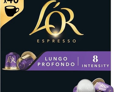 a coffee cup of coffee with a gold foil cap