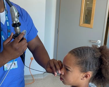 ENT surgeon performing flexible nasendoscopy