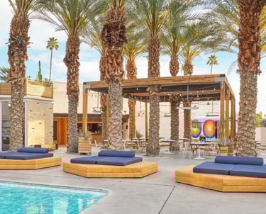 Poolside lounge area at Ace Hotel & Swim Club in Palm Springs, California, a relaxed romantic getaway for couples