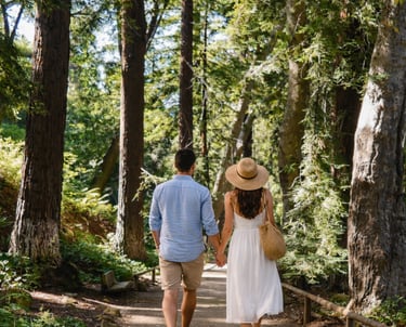 Couple strolling through Santa Barbara Botanical Gardens on a romantic getaway