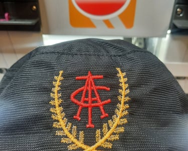 School logos on hats, bucket hats, polos. Embroidery and dtf printing Gold Coast nerang