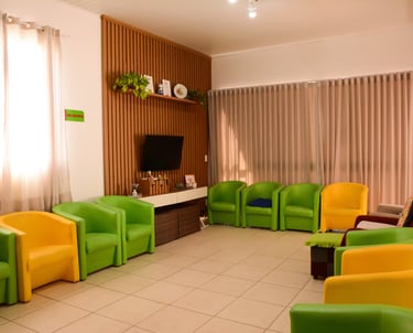 Sala de Estar com Poltronas e TV