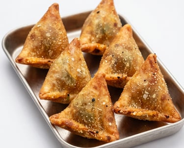 fried food on white ceramic bowl