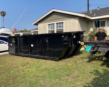 Our 18 cubic yard dumpster is ready for house junk cleanup