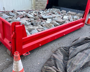 Our 5 ton dumpster filled with concrete. Please level fill only.