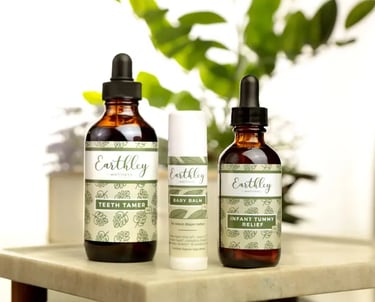 a bottle of earthy skin care products on a table