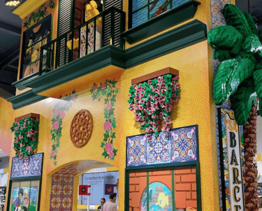 a building with a large window and a surfboard