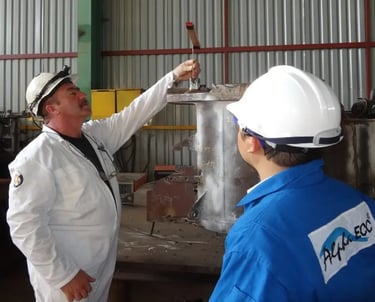 Engineers performing quality control inspection on industrial equipment.