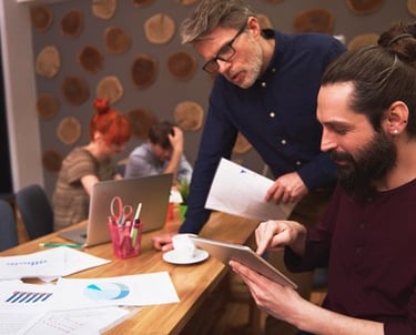 Saudi Food Registration Team brainstorming solutions at a conference table