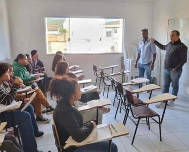 a man standing in front of a class room