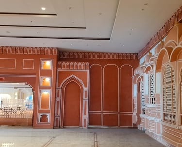 a large room with a red wall art
