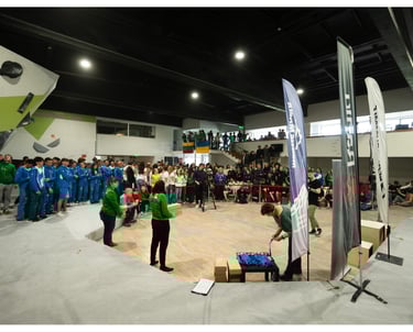 a group of people standing around a stage