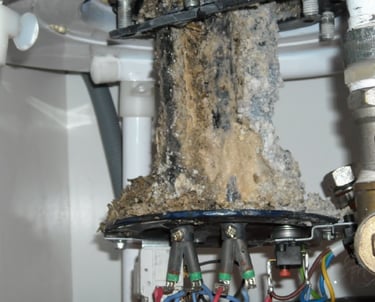 a dirty pipe with a pipe sticking out of it