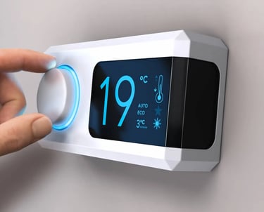 a person turning off thermostar on a wall