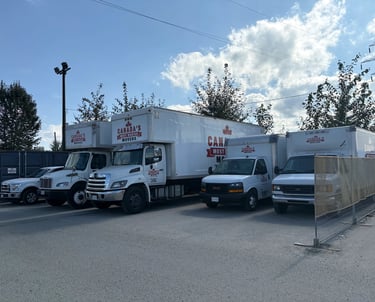 Canada’s Most Wanted Movers fleet lined up in a secure Port Coquitlam lot before dispatch.