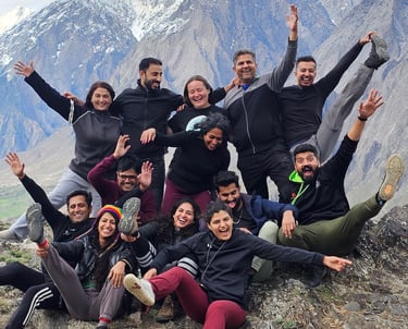 a group of people having fun on a retreat in the mountains