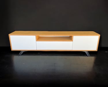 a tv unit with a white and yellow entertainment center