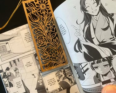 a person holding a book with a bookmark