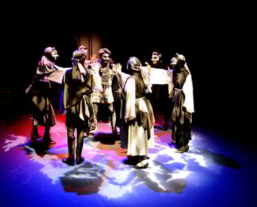 Cody Laper performing in The Burial at Thebes — a modern retelling of Antigone, exploring the clash.