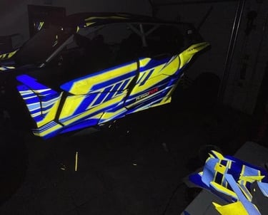 off road can am maverick reflective wrap. blue and fluorescent yellow wrap