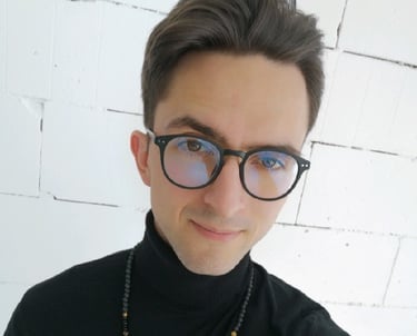 A handsome copywriter with glasses