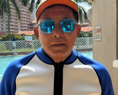 coach raymond oyougu aquatics