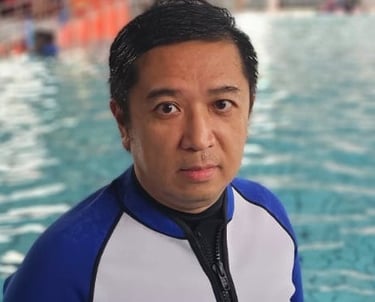 coach zac oyougu aquatics