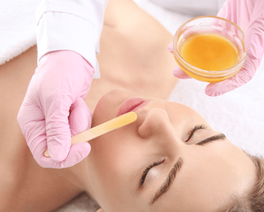 women getting upper lip waxing service at burlington nails