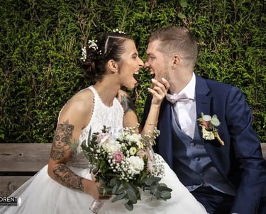 fantastic wedding photographer florent lille saint omer  paris a bride and groom kissing on a bench 