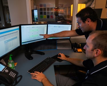 Vital Marine team reviewing boat flooring options during SeaDek consultation and quote process