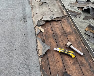 Exposed Flat Roofing Woodwork prior to having replacement