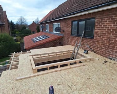 Exposed conservatory roof woodwork before installation