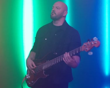 a man with a guitar and a guitar