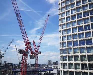 Building under construction with cranes