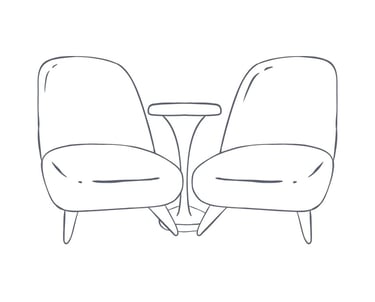 a pair of chairs with a table, a visual representation of the compatibility of NLP and Hypnotherapy