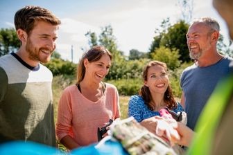 a group of people standing around