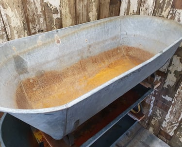 a bathtub with rusted metal tub
