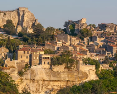 Panoramic view of the medieval hilltop village Les Baux-de-Provence in France at sunset.